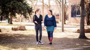 Traci Hartley and Rose walking together.